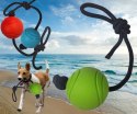 Piłka dla psa na sznurku gumowa średniotwarda plastyczna 7 cm zielona